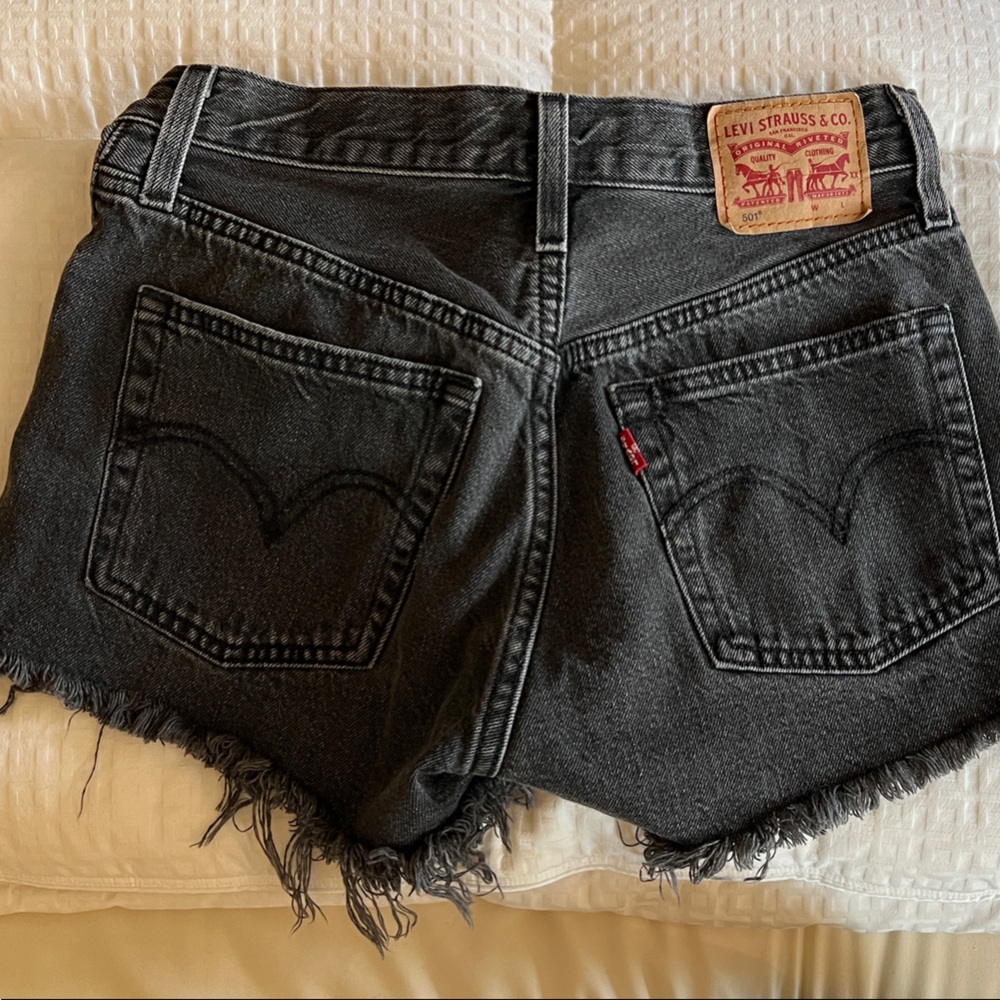 Levi's Washed Black Frayed Denim Cutoff Shorts
